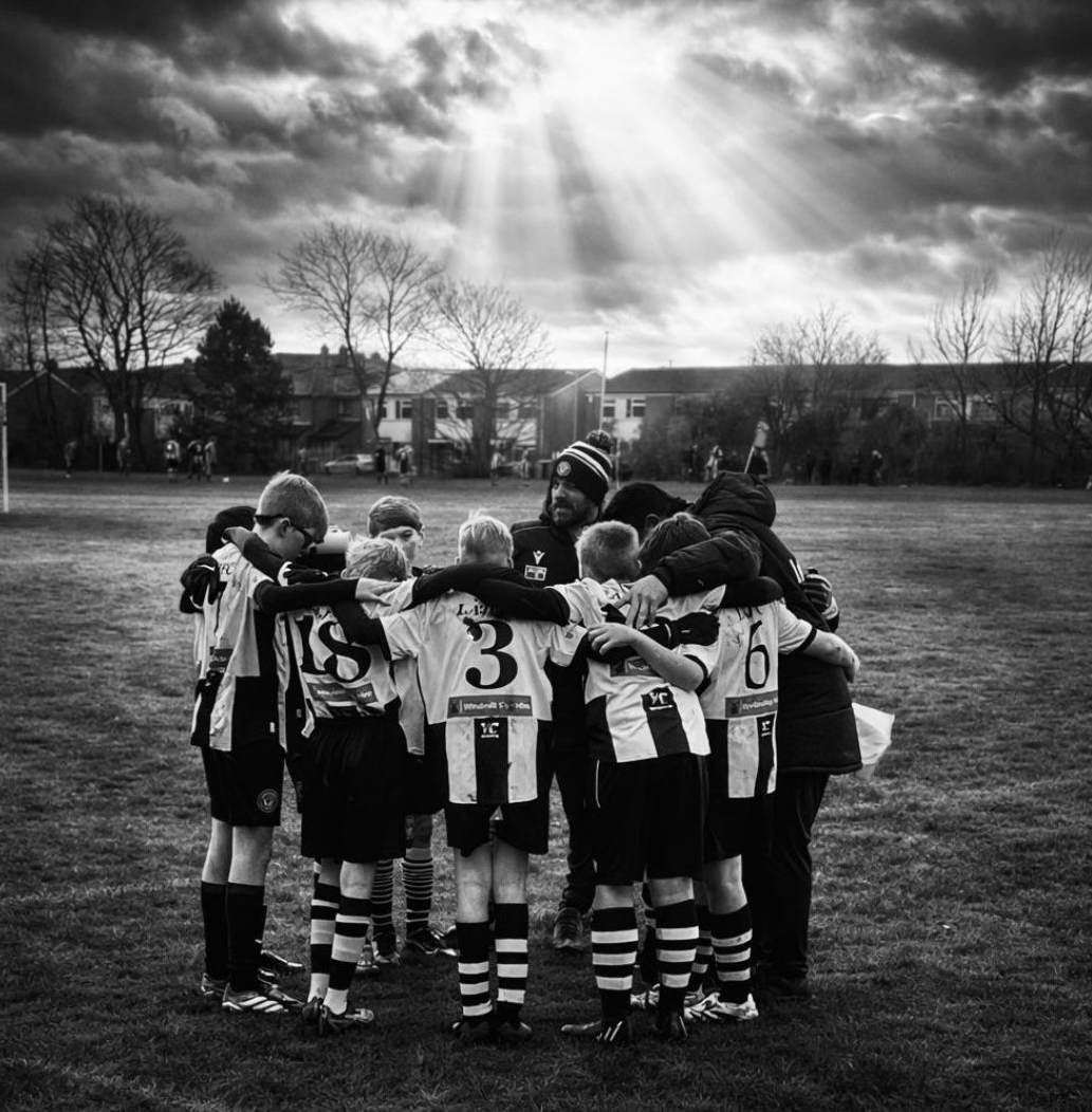 Litherland Athletic JFC team huddle